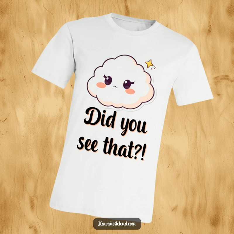 Funny t-shirt featuring a cloud character with big, surprised eyes watching a small, magical shooting star streak across the sky.