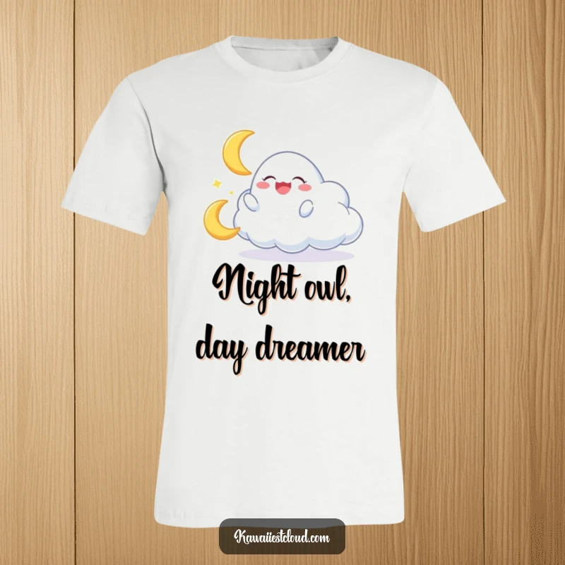 Funny t-shirt featuring a cloud character joyfully interacting with a miniature, giggling crescent moon, capturing pure delight.
